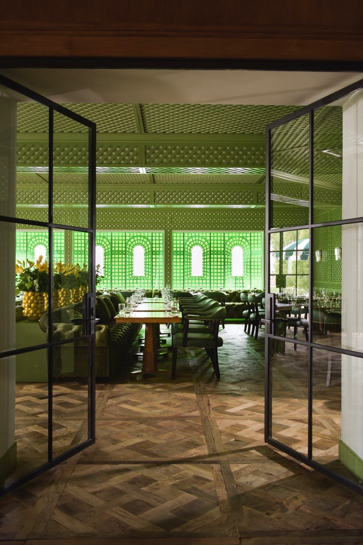 Versailles panel floor through steel doors to green dining room