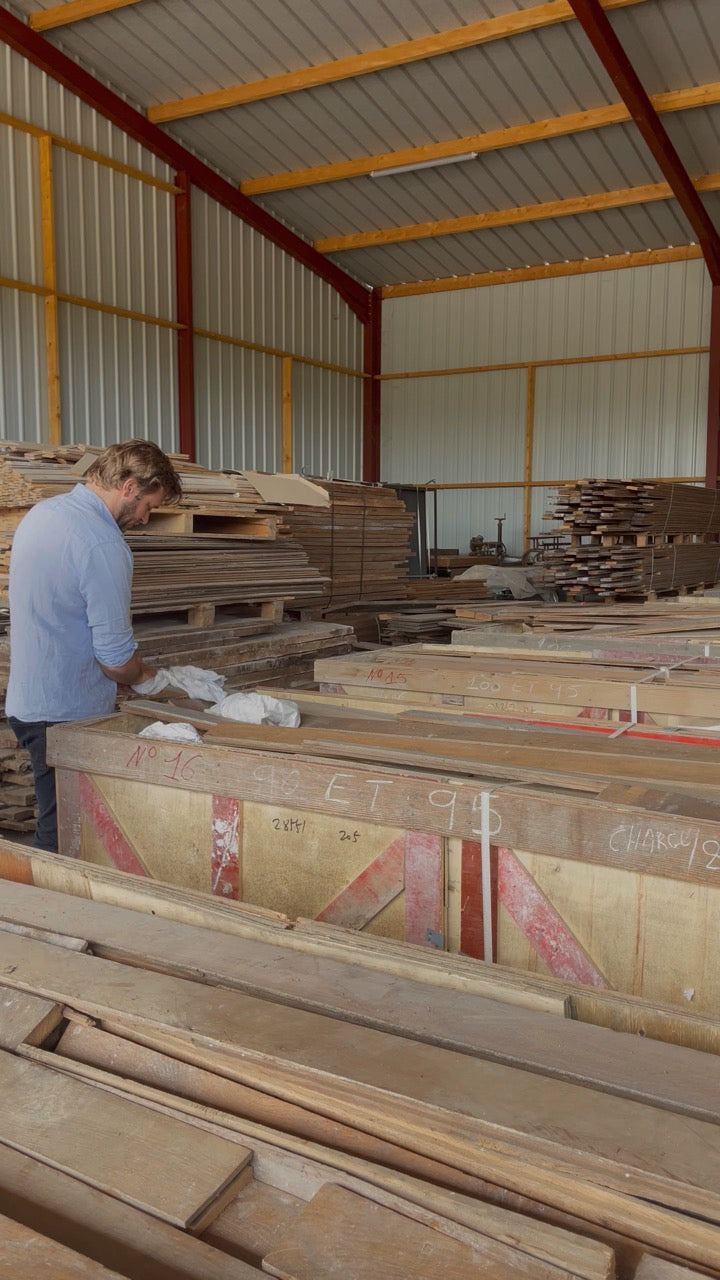 Sorting reclaimed Haussmann oak chevron boards