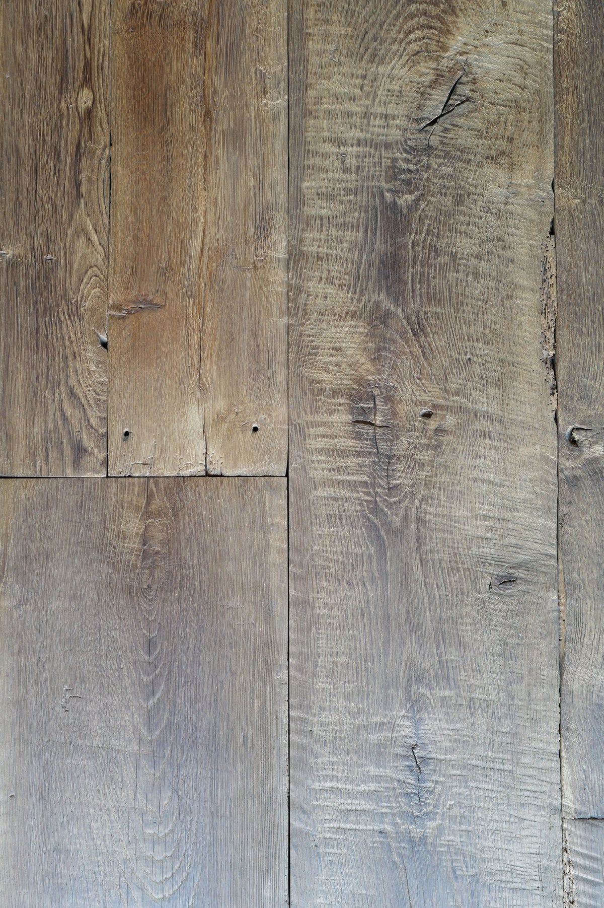 Reclaimed French oak floorboards showing original saw marks and nail holes