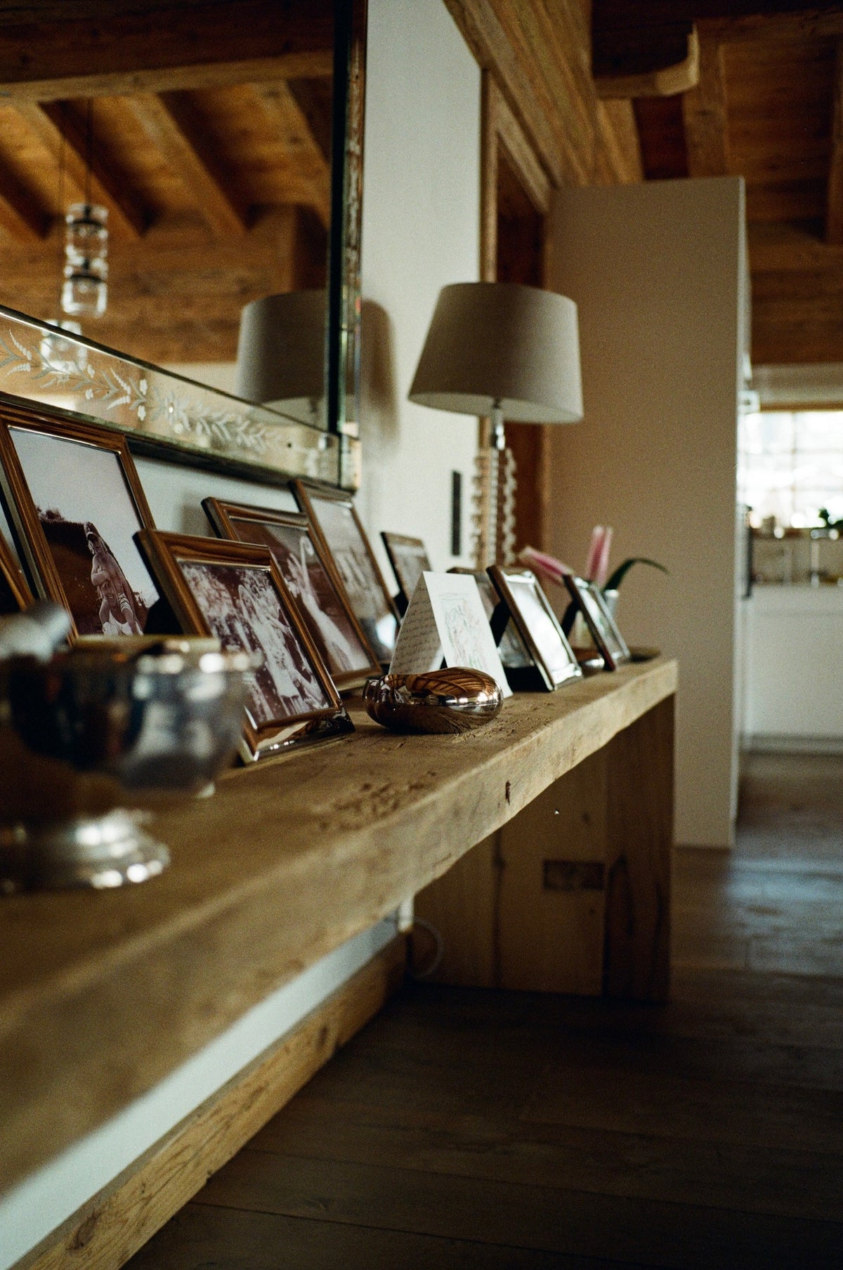 Reclaimed oak console table in a chalet hallway
