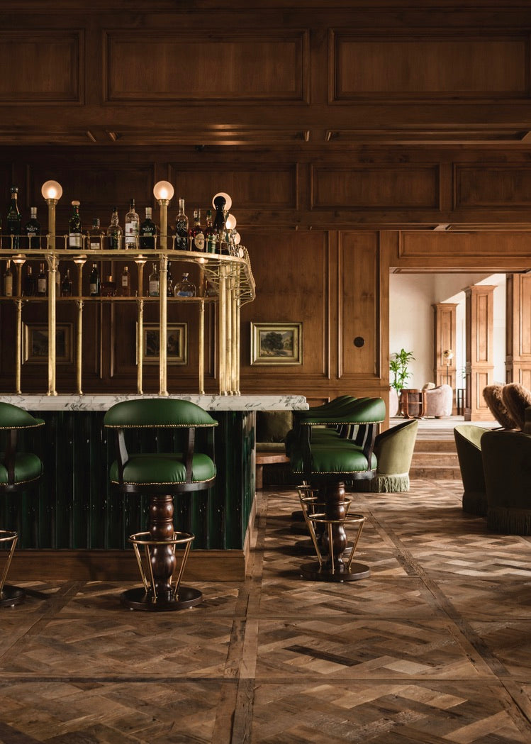 Reclaimed French oak Versailles panel floor in a panelled bar