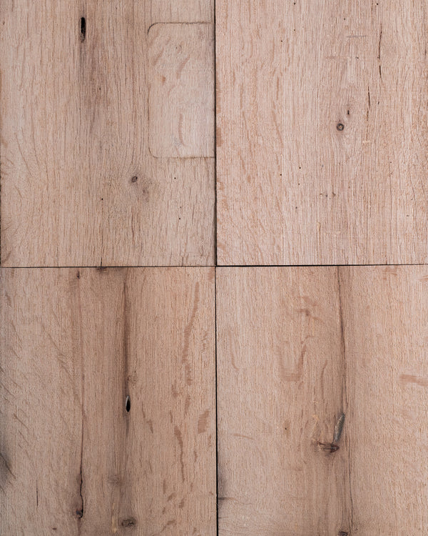 Close-up of resawn reclaimed American oak beams showcasing rustic texture and unique grain patterns.