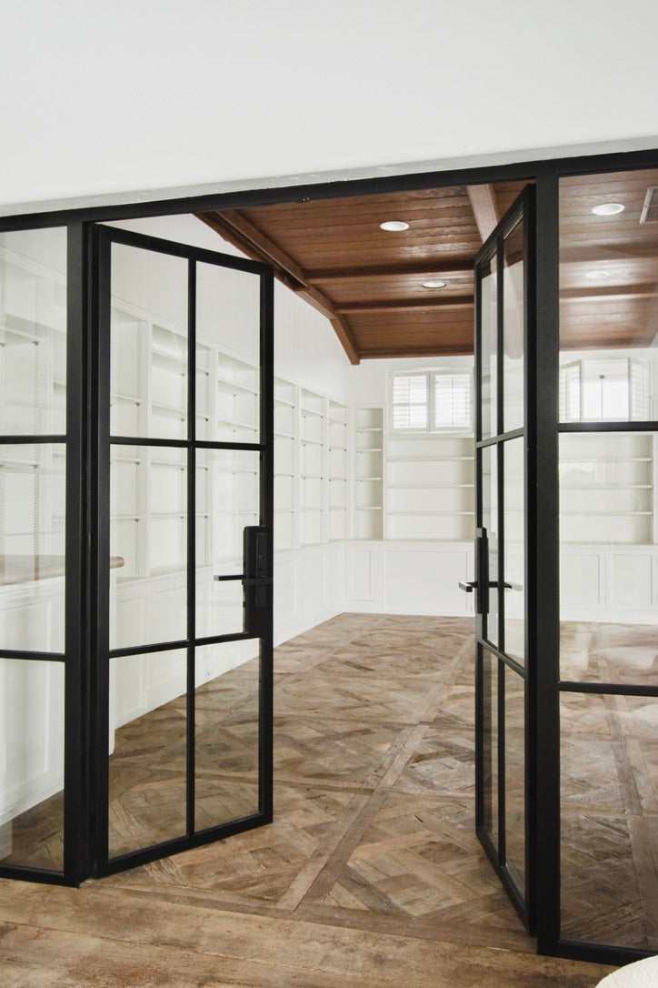 Versailles panel floor in library through steel doors