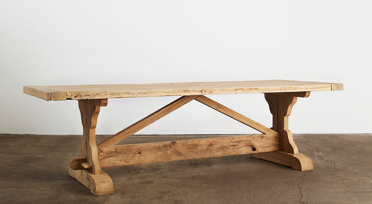 Custom reclaimed French oak trestle table