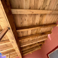 Resawn reclaimed American oak beams showcasing rustic texture and unique grain patterns.