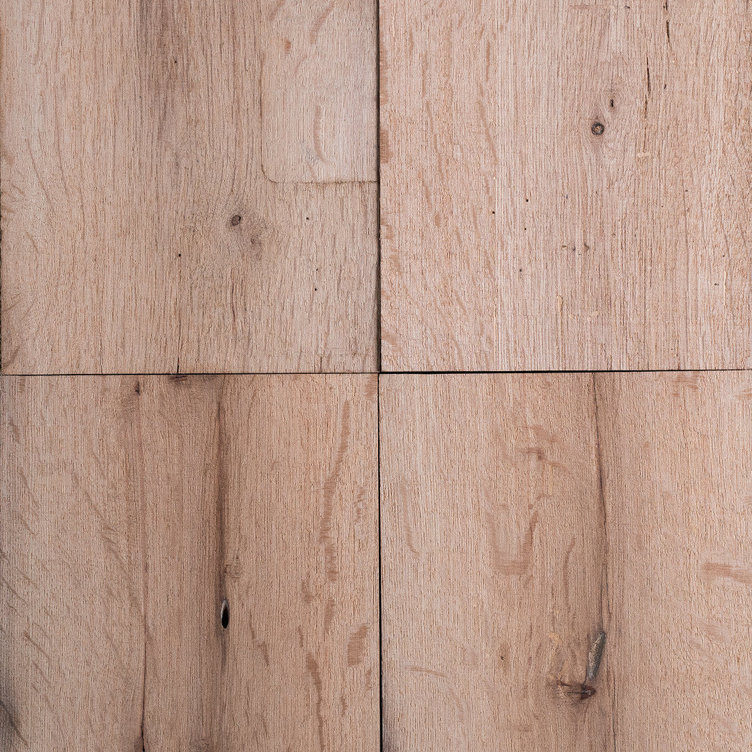 Close-up of resawn reclaimed American oak beams showcasing rustic texture and unique grain patterns.