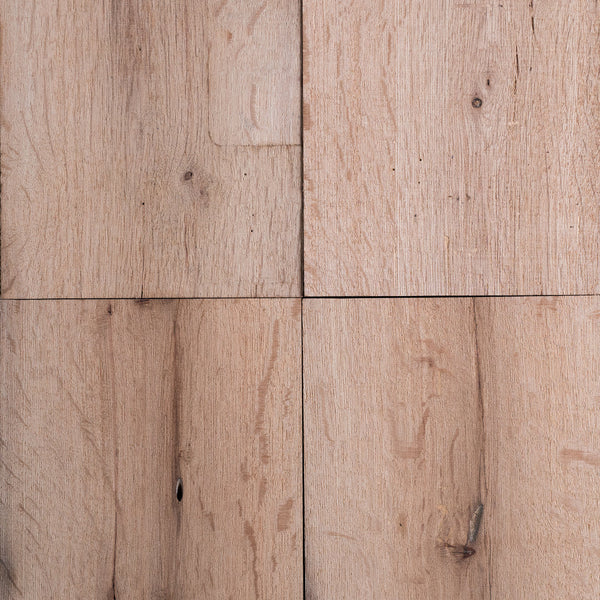 Close-up of resawn reclaimed American oak beams showcasing rustic texture and unique grain patterns.