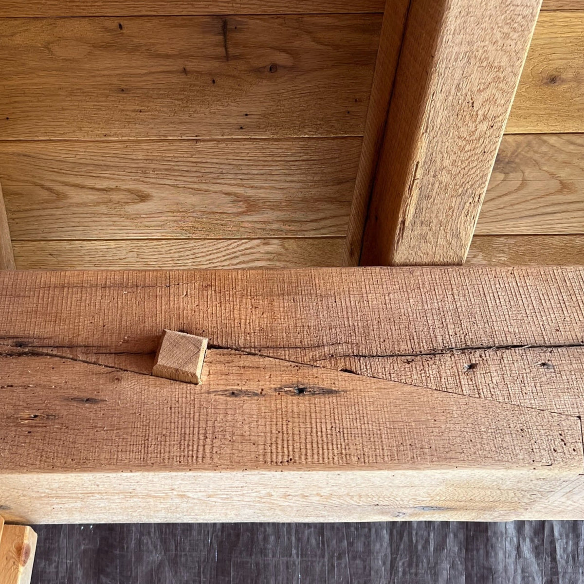 Resawn reclaimed American oak beams showcasing rustic texture and unique grain patterns.