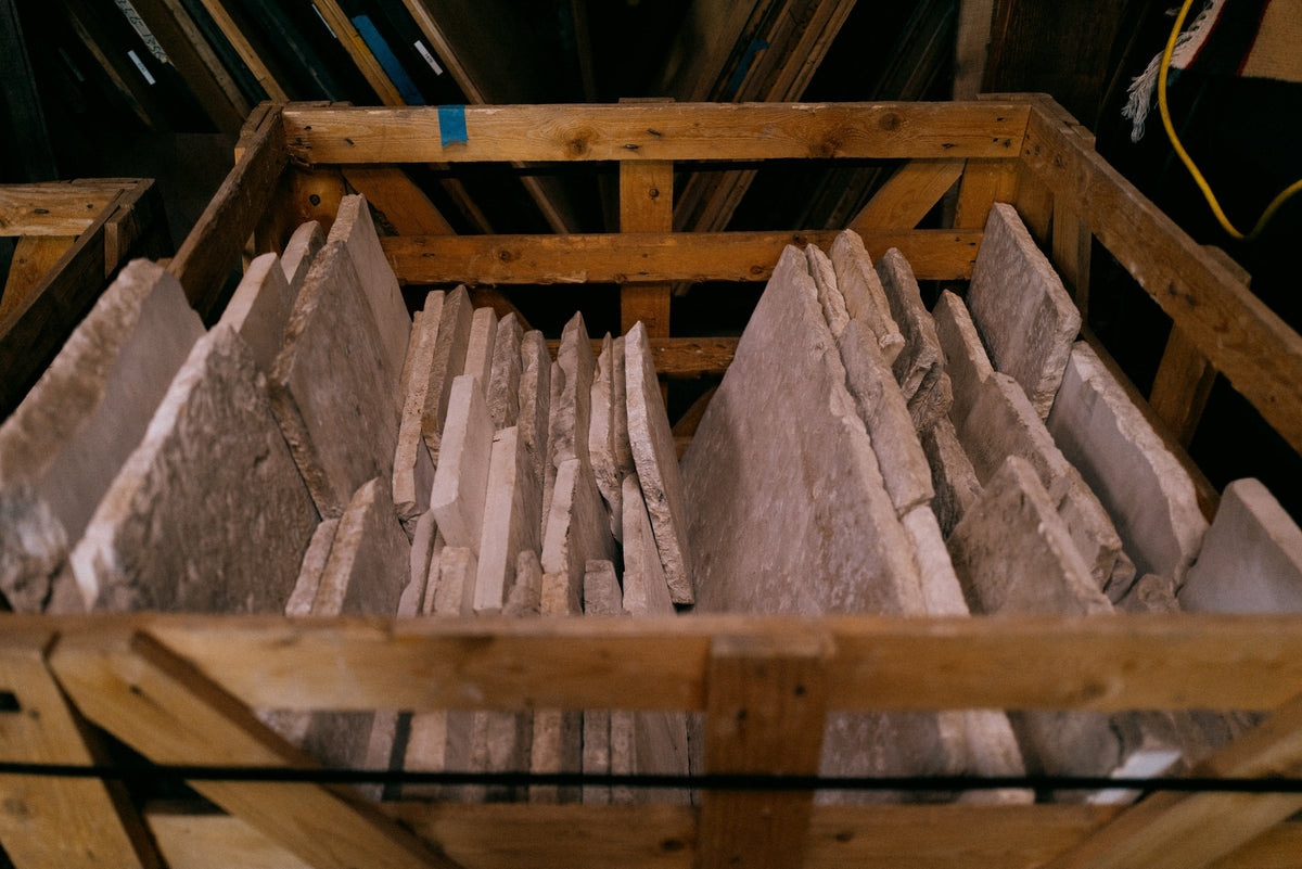 Crate of reclaimed Basilica Italian limestone slabs