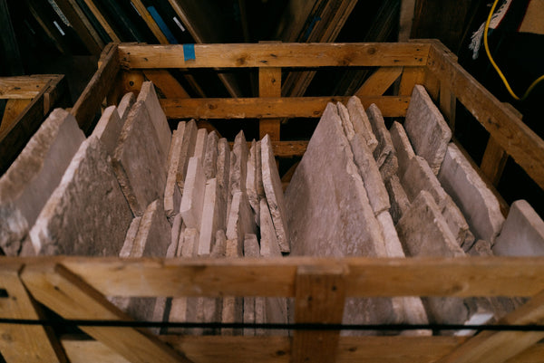 Crate of reclaimed Basilica Italian limestone slabs