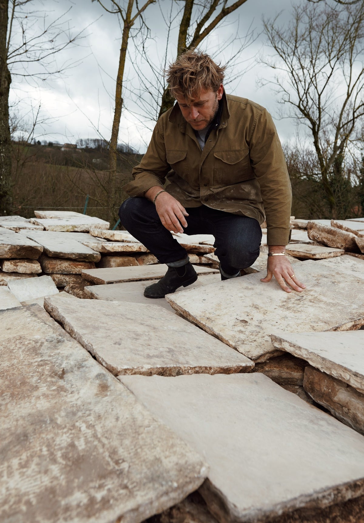 Inspecting reclaimed limestone slabs at the source