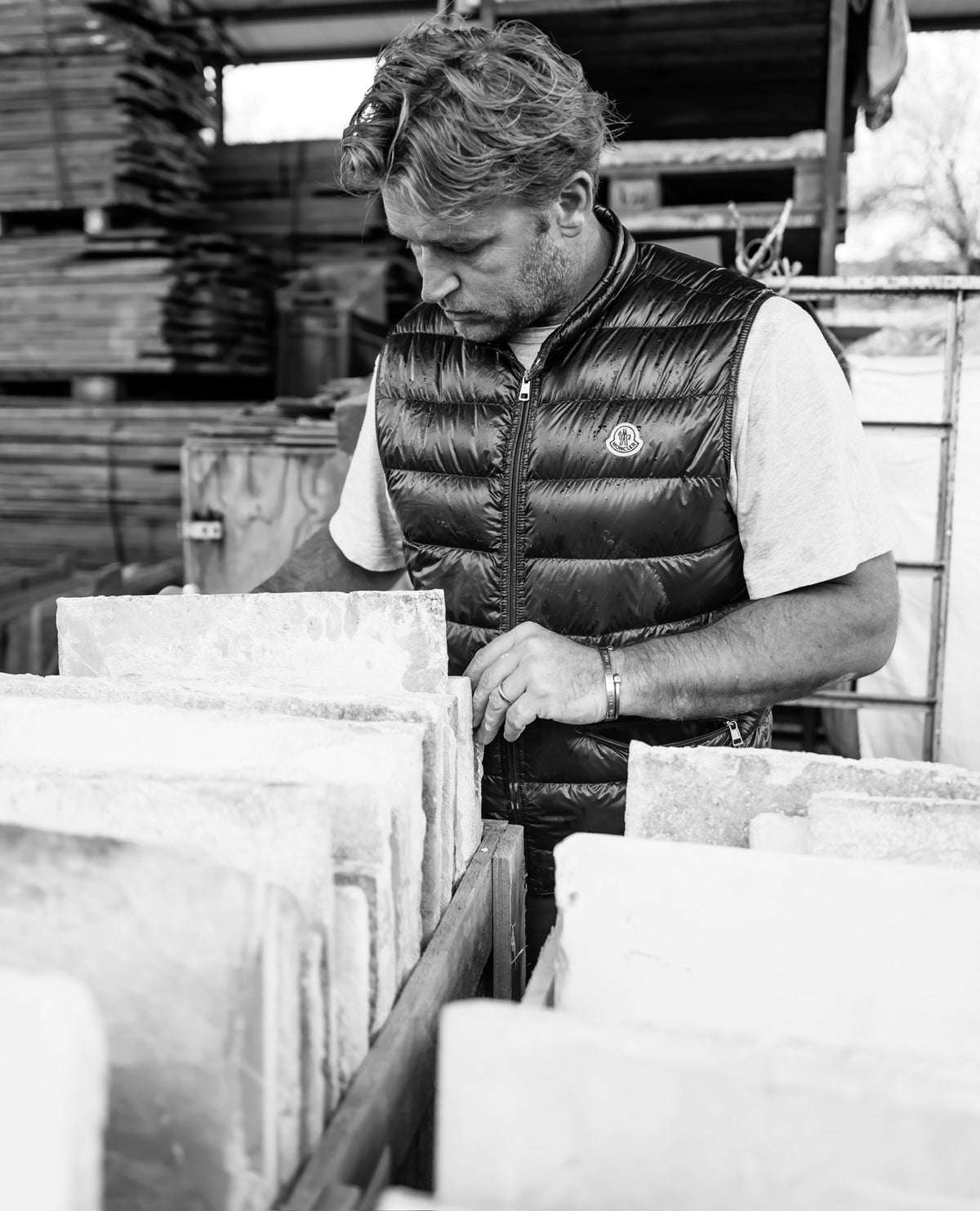 Sorting reclaimed limestone slabs by hand