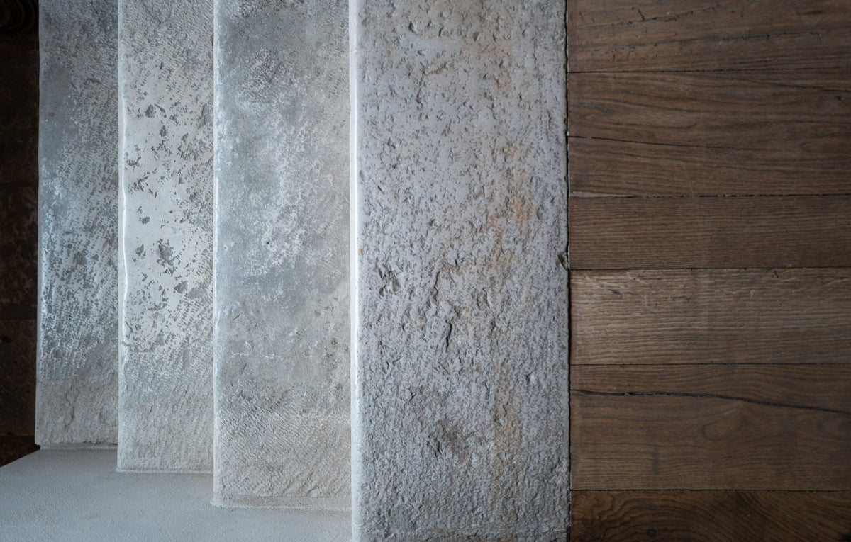 Reclaimed Basilica Italian limestone steps beside reclaimed oak flooring