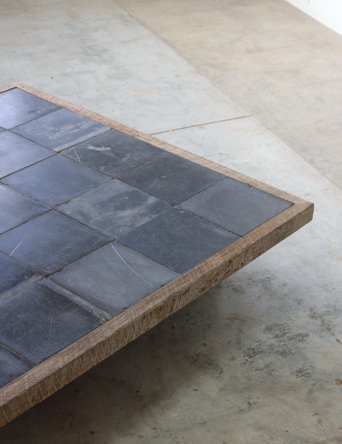 Reclaimed Belgian church tiles set in a reclaimed oak frame