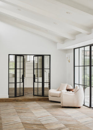 Haussmann chevron oak floor with steel doors
