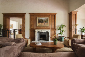 Haussmann chevron oak floor by fireplace