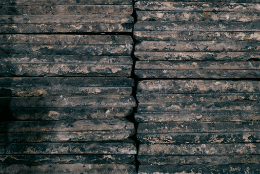 Stacked reclaimed Belgian black church tiles