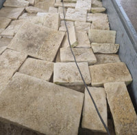Reclaimed Dalle de Bourgogne limestone pieces showing consistent color and patina
