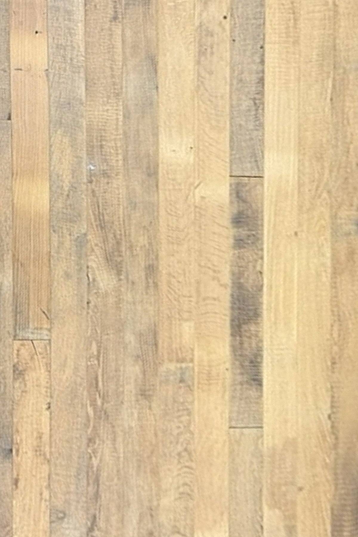 Top-down view of reclaimed original French oak floorboards, 3 inch wide engineered, random lengths