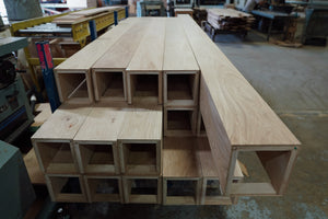 Stack of old growth French oak box beams made to order