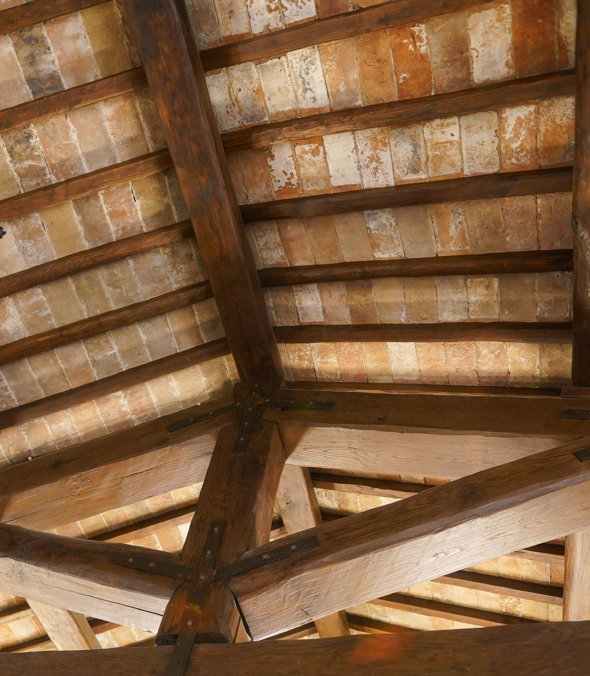 Parefeuille terracotta ceiling with oak trusses