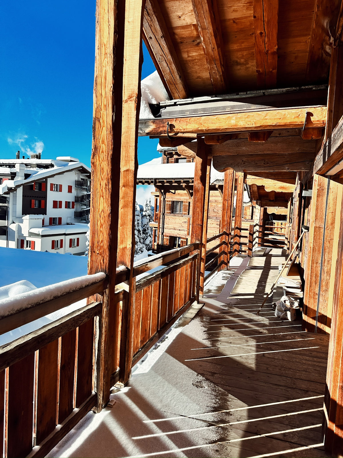 Reclaimed pine posts and beams on an Alpine chalet balcony