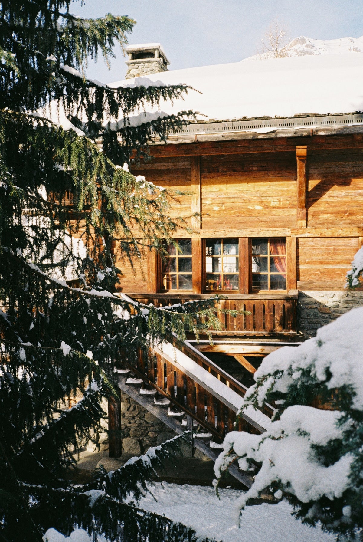 Alpine chalet exterior clad in weathered pine