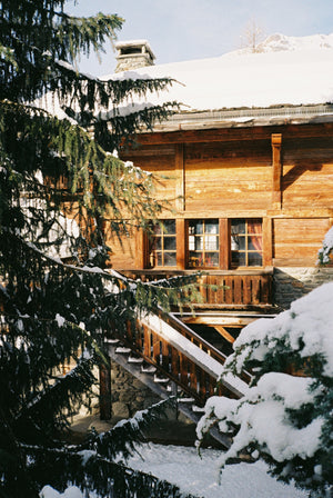 Alpine chalet exterior clad in weathered pine