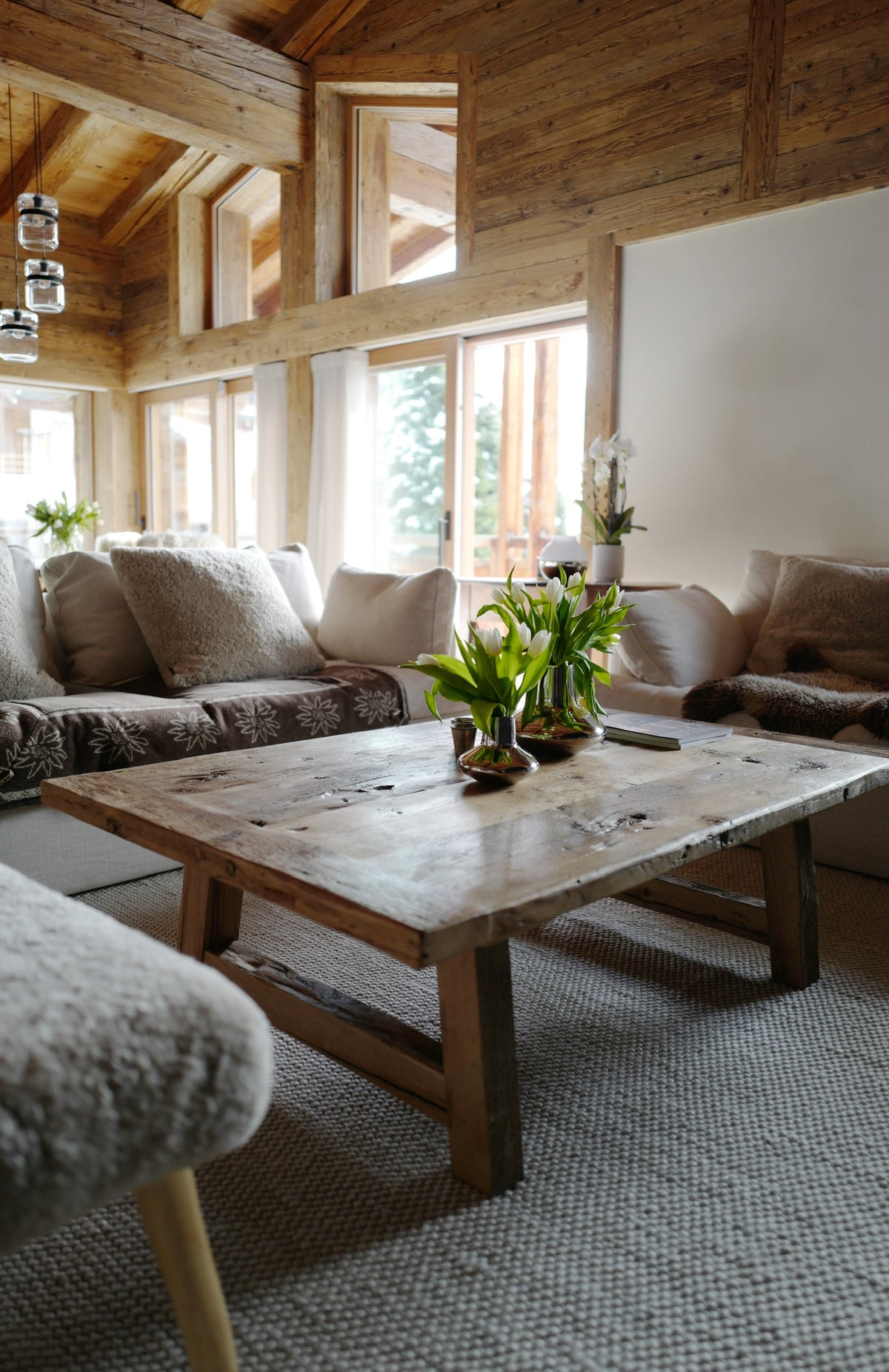 Chalet living room clad in reclaimed European pine