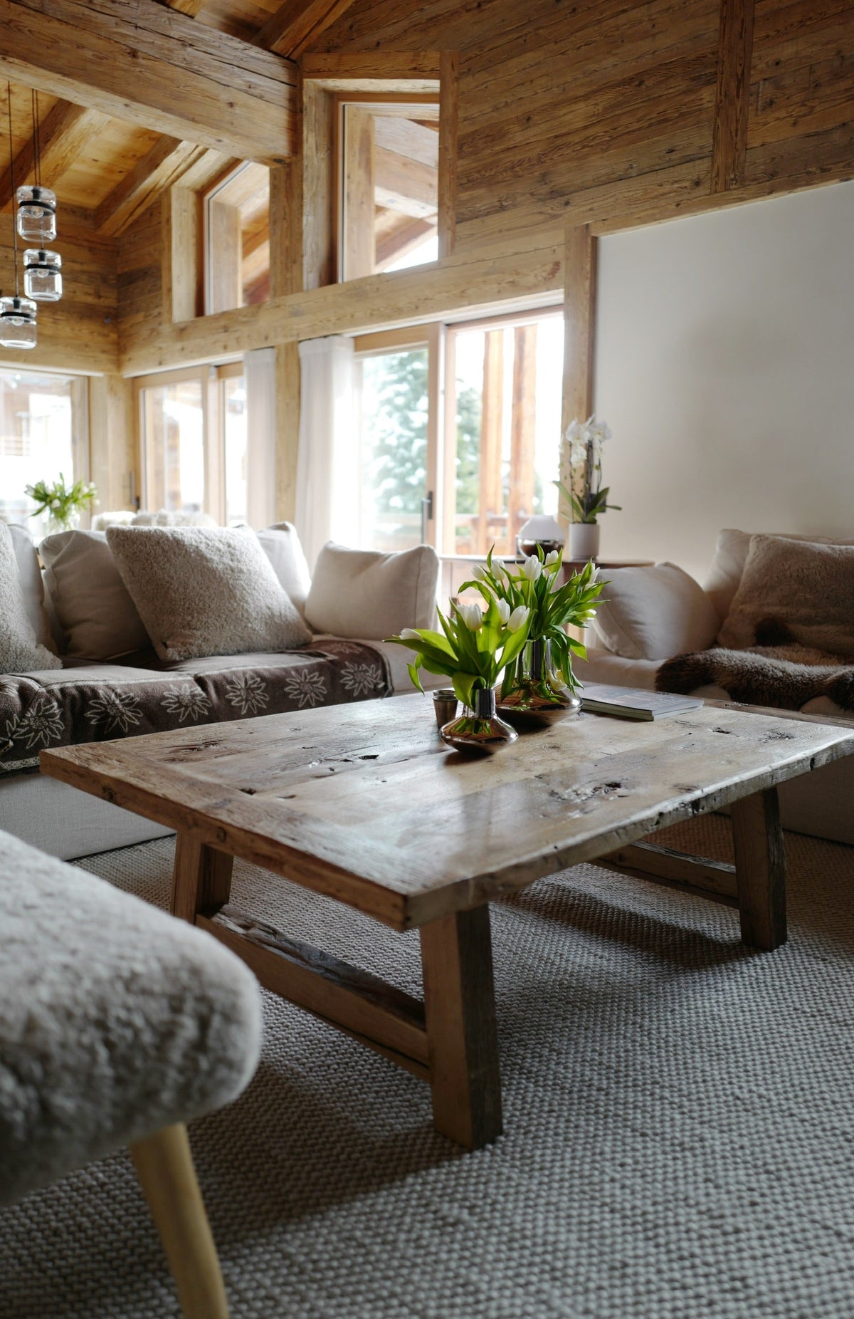 Custom reclaimed French oak coffee table in a chalet living room