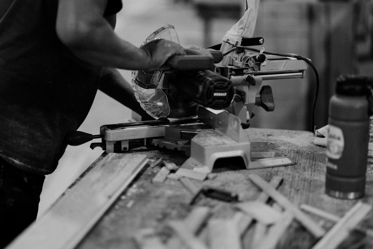 Reclaimed oak being cut and processed in the workshop