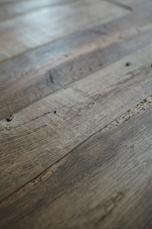 Close-up texture of reclaimed French oak floorboard surface