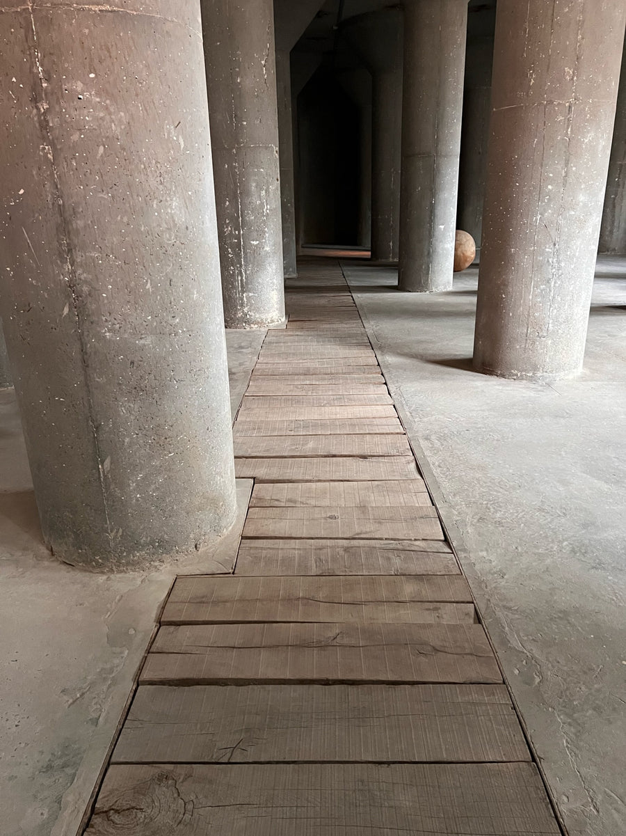 Reclaimed oak path between concrete columns